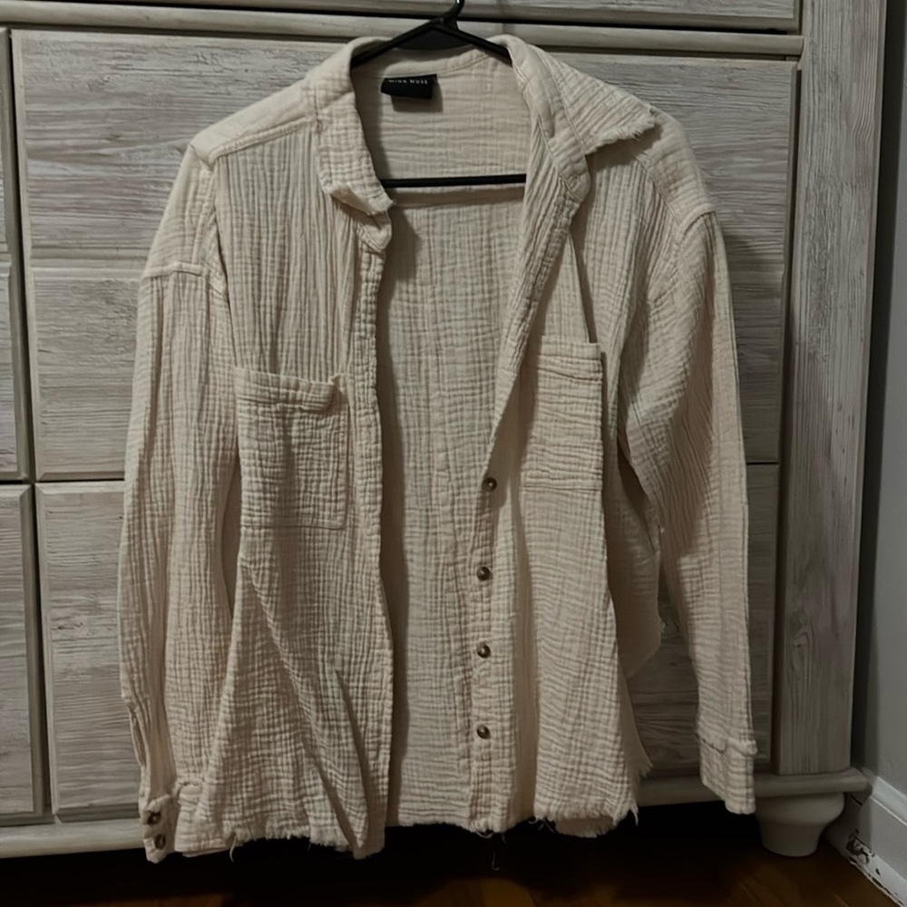Dusty pink button up with frayed sleeves
